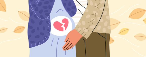An illustration of a woman who has had a miscarriage being comforted by her partner.