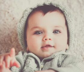 Young baby with light-colored eyes.