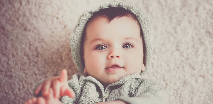 Young baby with light-colored eyes.