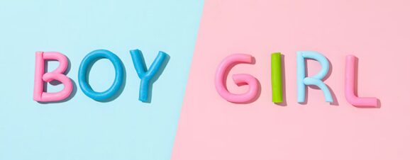 The words "Boy" and "Girl" on a blue and pink background.