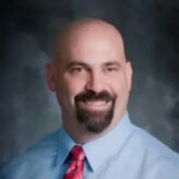 Barry Aron's headshot.