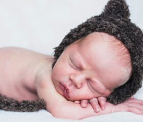 A 2-week-old baby sleeping.
