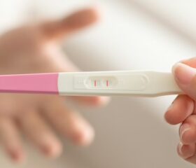 Closeup of a positive ovulation test, which increases the chances of getting pregnant.