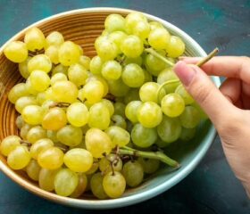 Bowl of freshly washed green grapes.