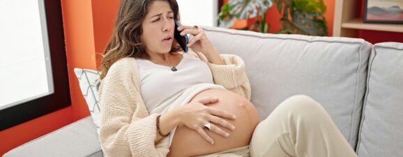 Pregnant woman experiencing symptoms of placental abruption.